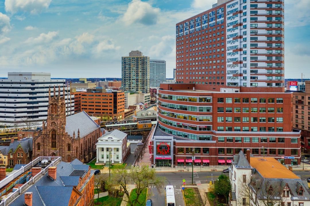Downtown view of Rutgers University campus buildings in New Brunswick, NJ near River Road Estates luxury home community